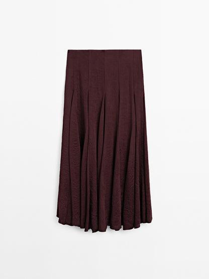Flowing midi skirt with godet details