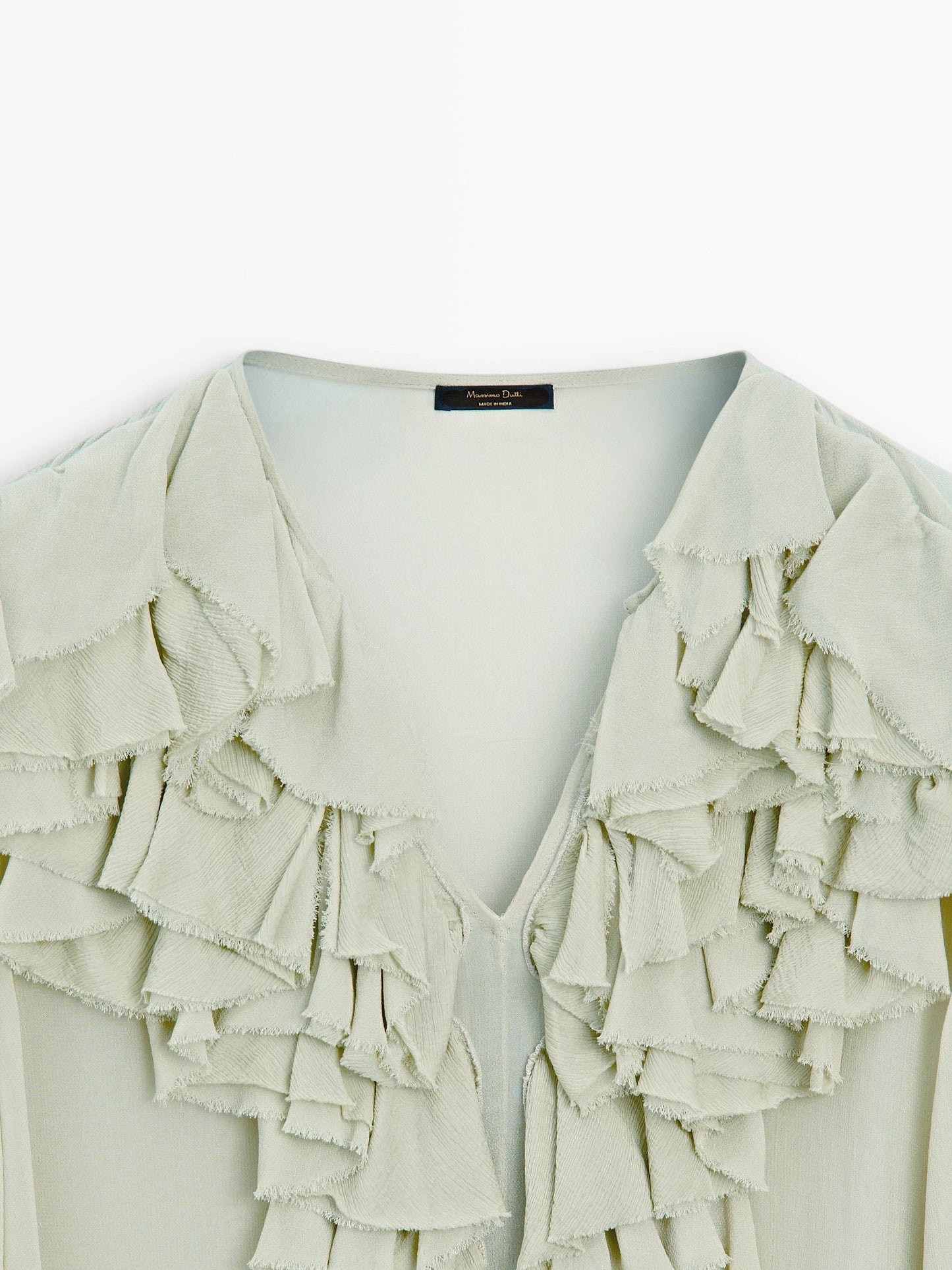 Flowing blouse with ruffled neckline