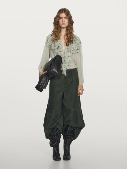 Flowing blouse with ruffled neckline