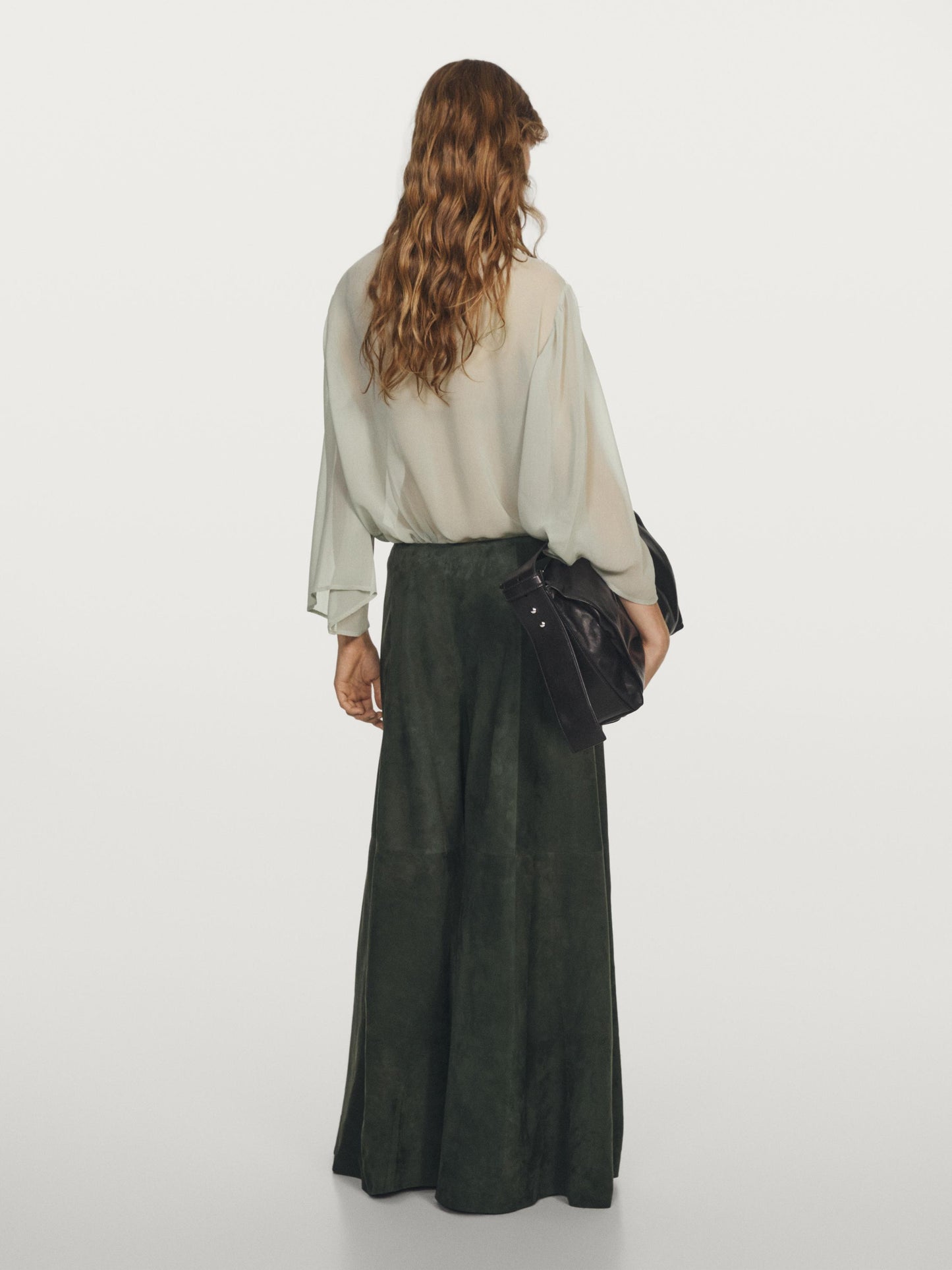 Flowing blouse with ruffled neckline