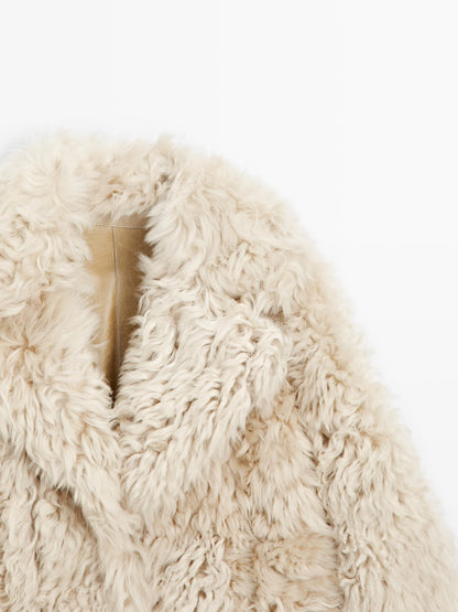 Short leather coat with fur