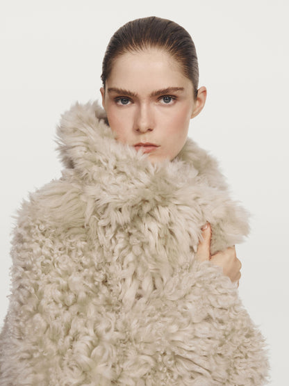 Short leather coat with fur