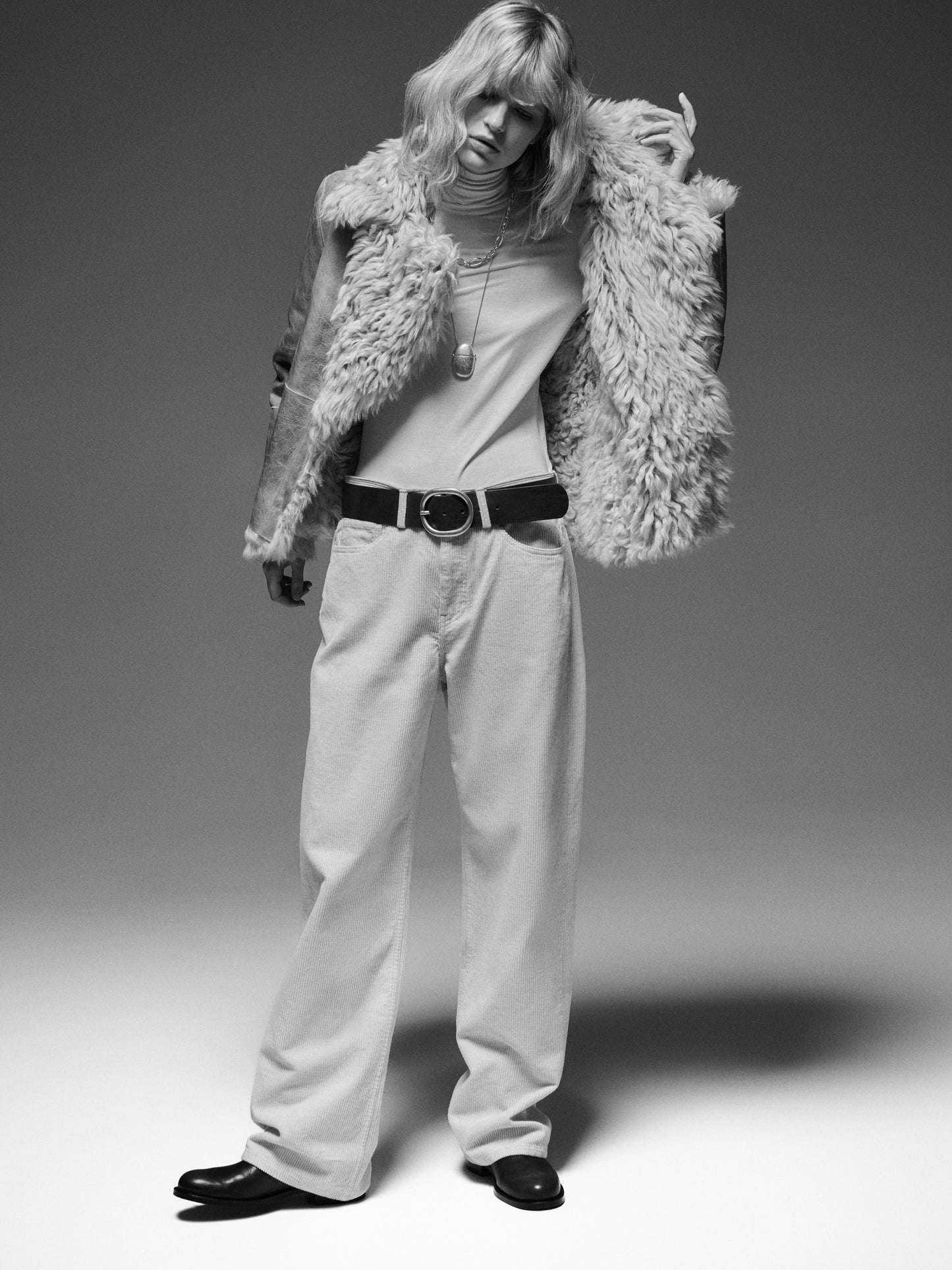 Short leather coat with fur