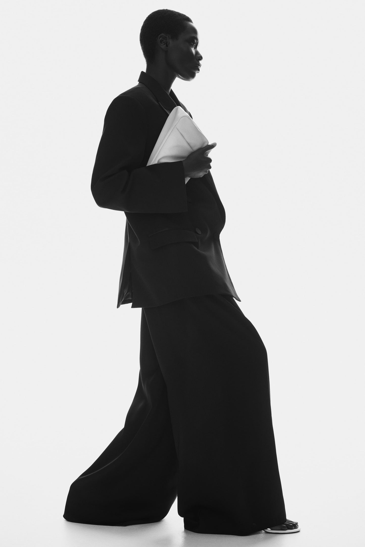 Belted pleat-detail trousers