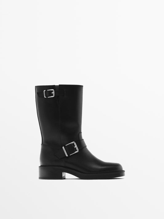 Flat ankle boots with buckles