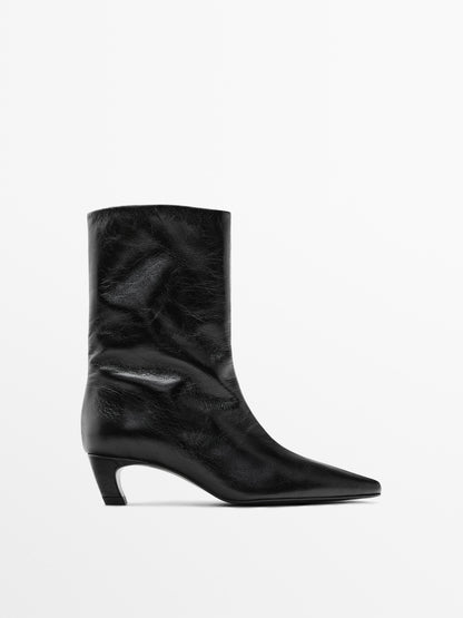 Leather high heel ankle boots