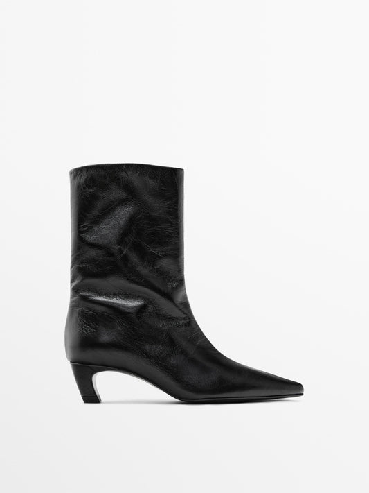 Leather high heel ankle boots