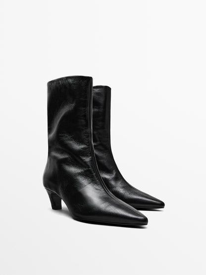 Leather high heel ankle boots