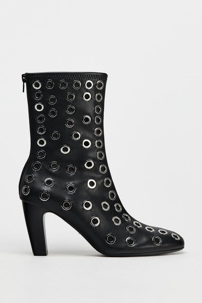 Heeled ankle boots with metal eyelets