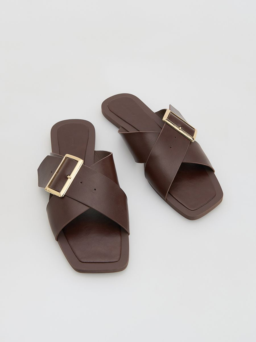 Sliders with decorative buckle
