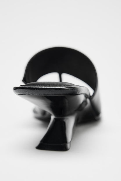 Asymmetric Wedge Heel