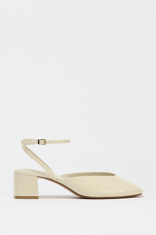 Embossed block heel slingbacks