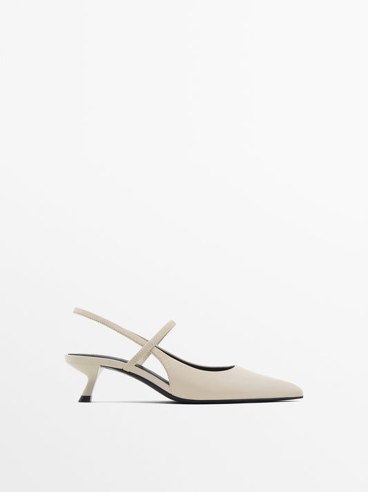 Slingback shoes with elastic instep