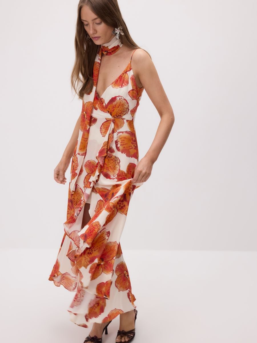 Patterned dress with sash
