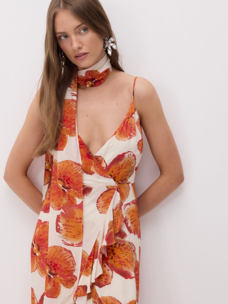 Patterned dress with sash