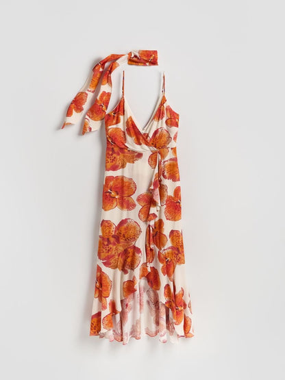 Patterned dress with sash