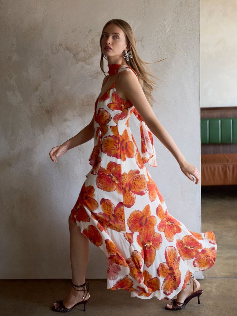 Patterned dress with sash