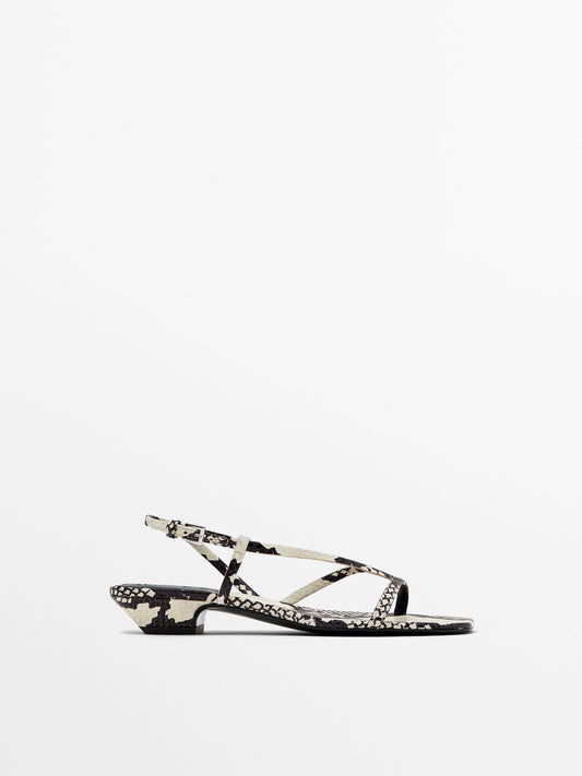 Heeled animal print sandals