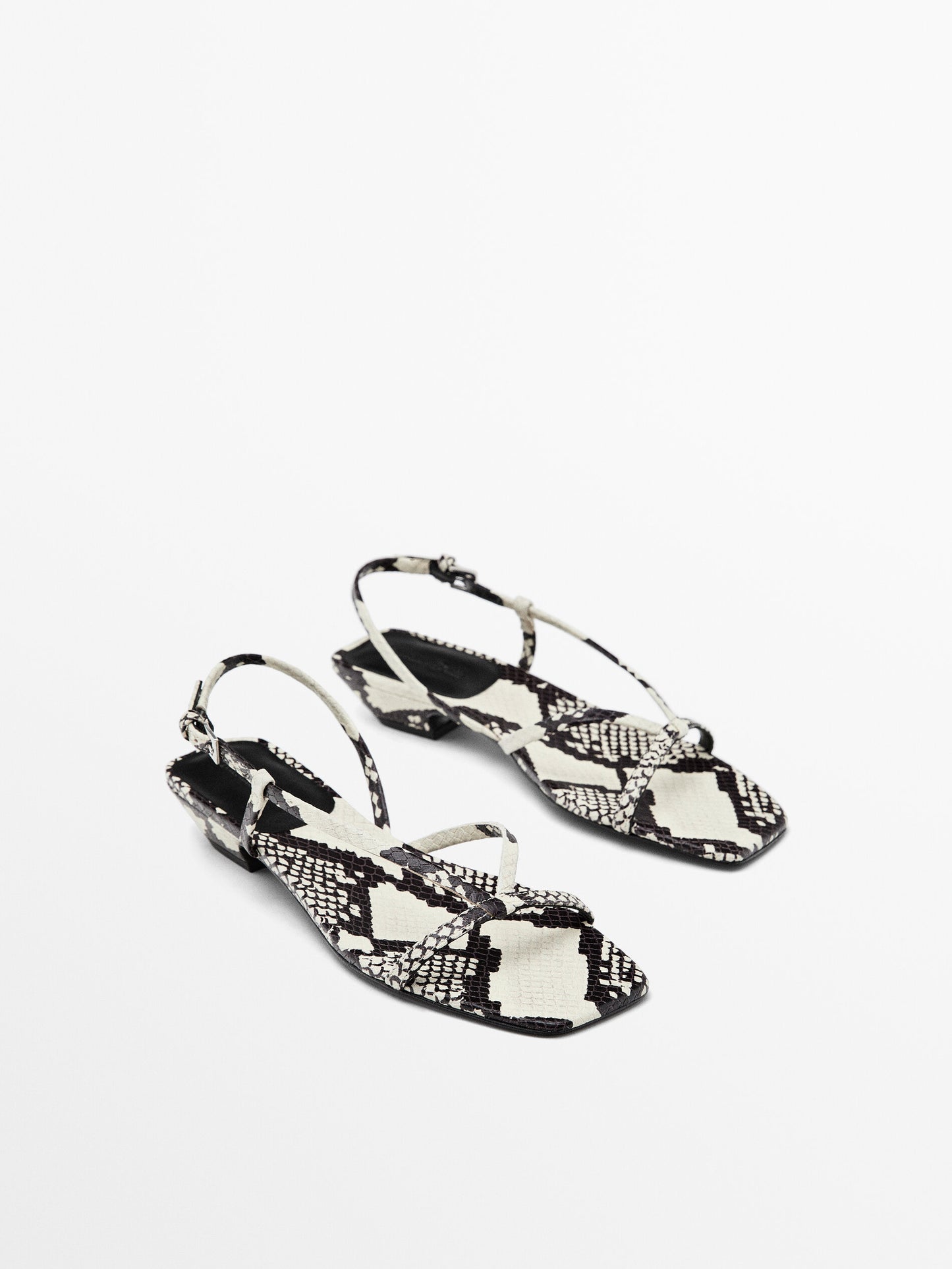 Heeled animal print sandals