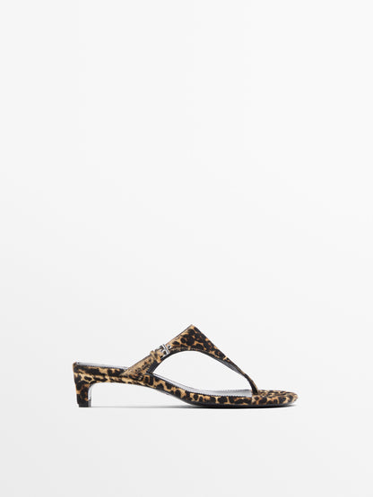 Heeled animal print sandals with buckle