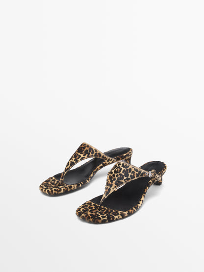 Heeled animal print sandals with buckle