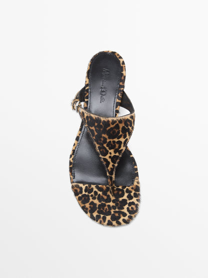 Heeled animal print sandals with buckle