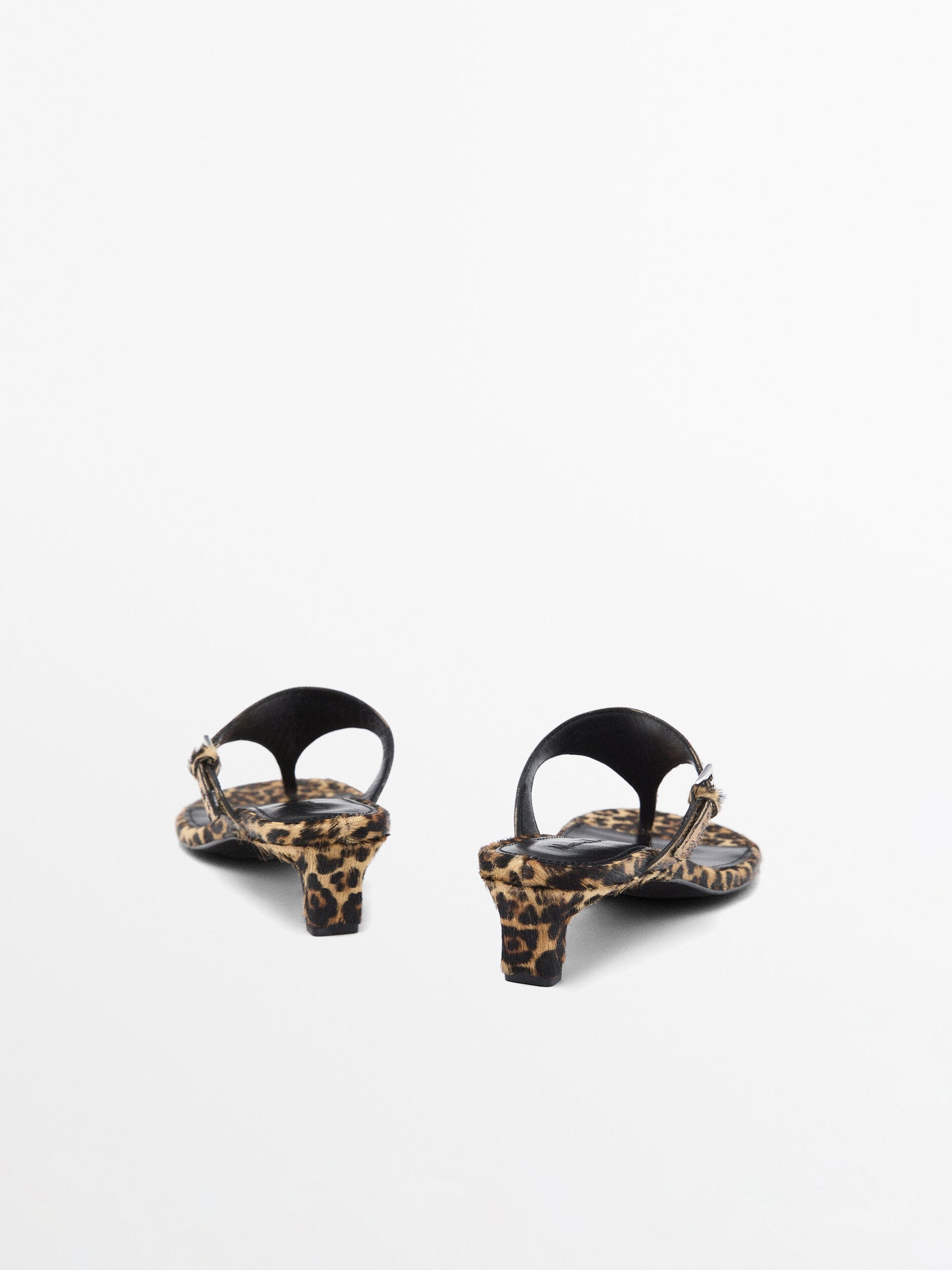 Heeled animal print sandals with buckle