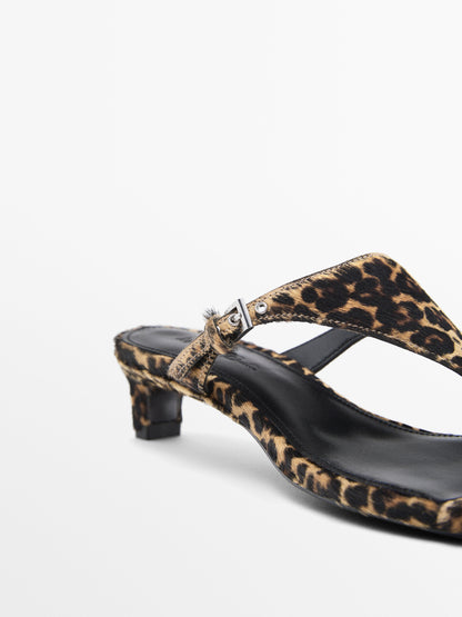 Heeled animal print sandals with buckle