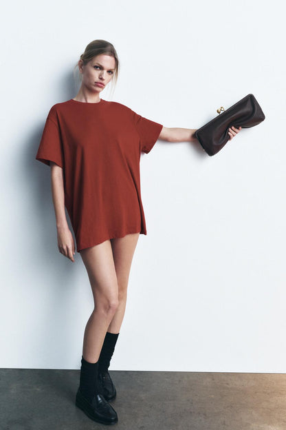 Leather clutch bag with metal detail