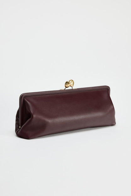 Leather clutch bag with metal detail