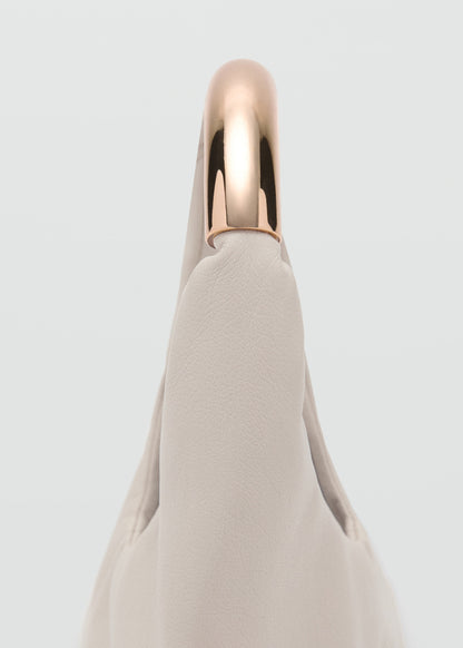 Handbag with metal handle