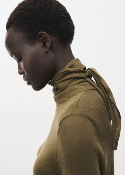 Knotted turtleneck sweater