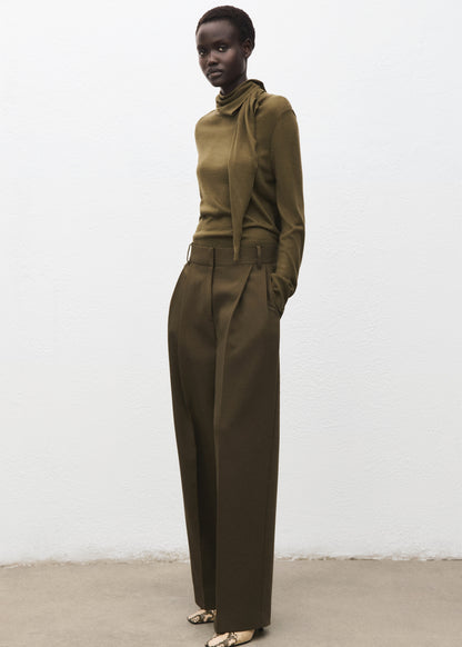Knotted turtleneck sweater