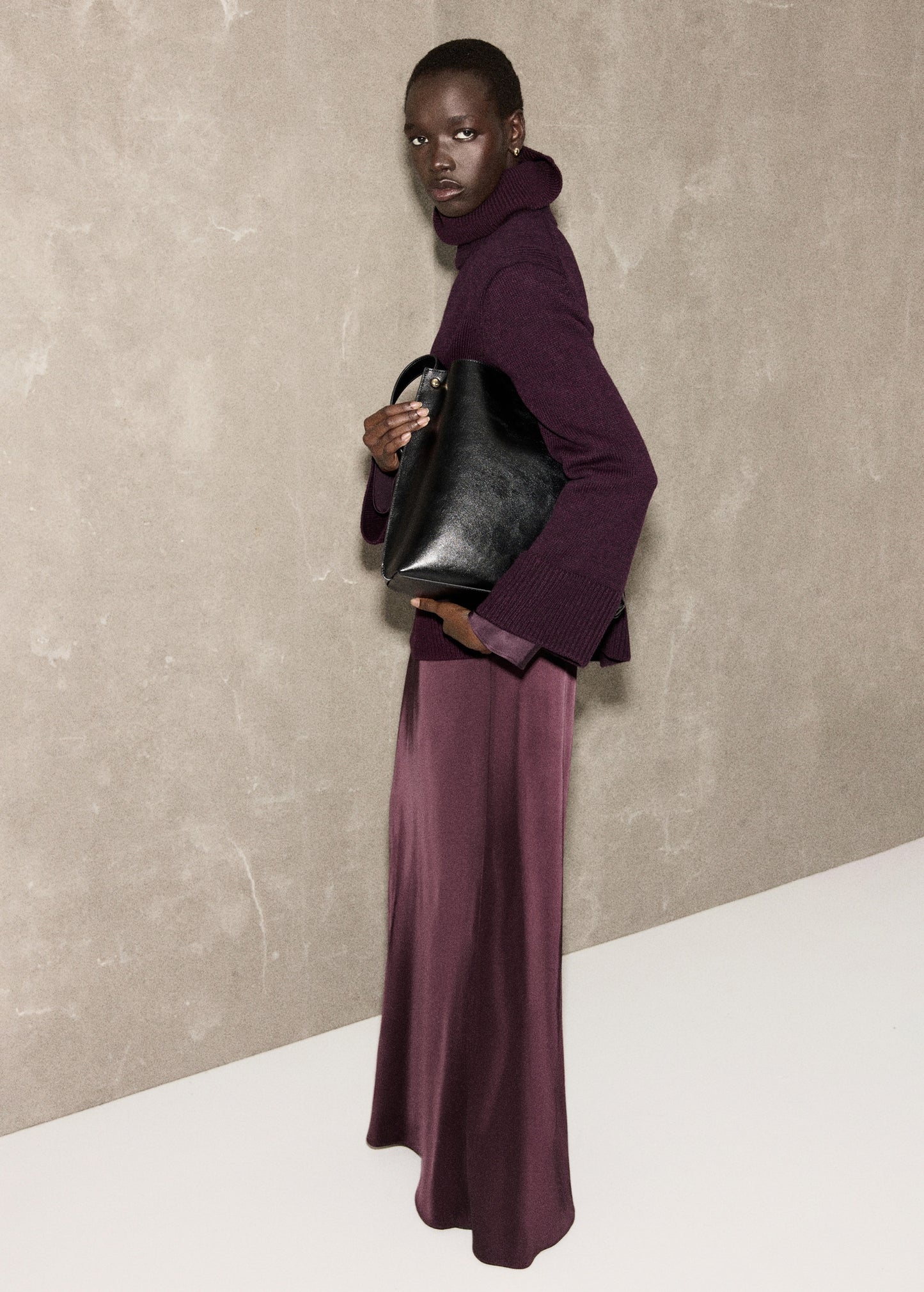 Turtleneck sweater with slits