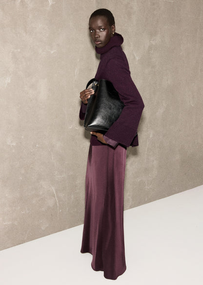 Turtleneck sweater with slits