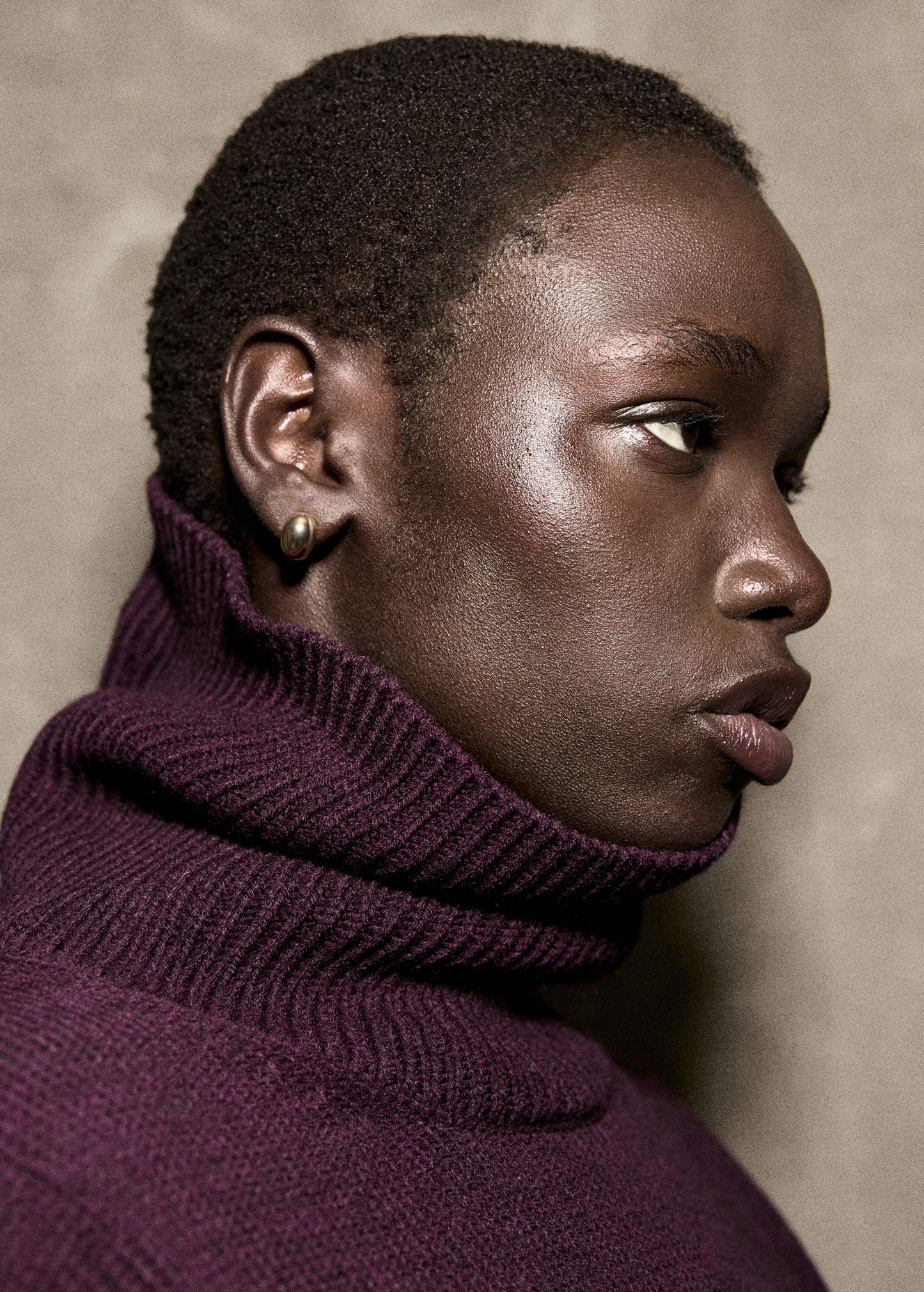 Turtleneck sweater with slits