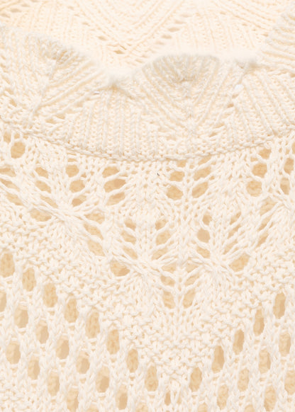 Knitted sweater with openwork details
