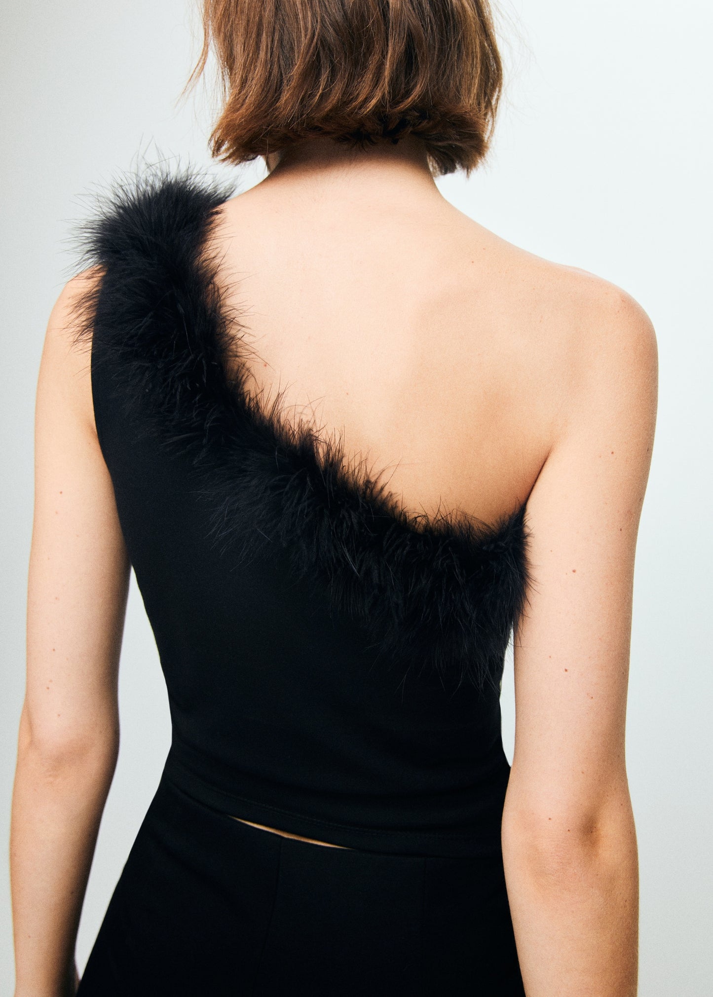 Asymmetrical speckled top