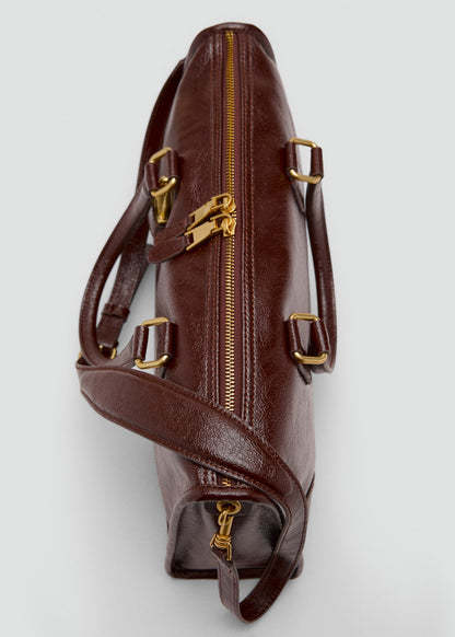 Bag with shiny finish and handles