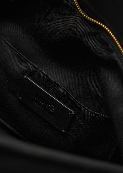 Leather clutch bag with metallic detail