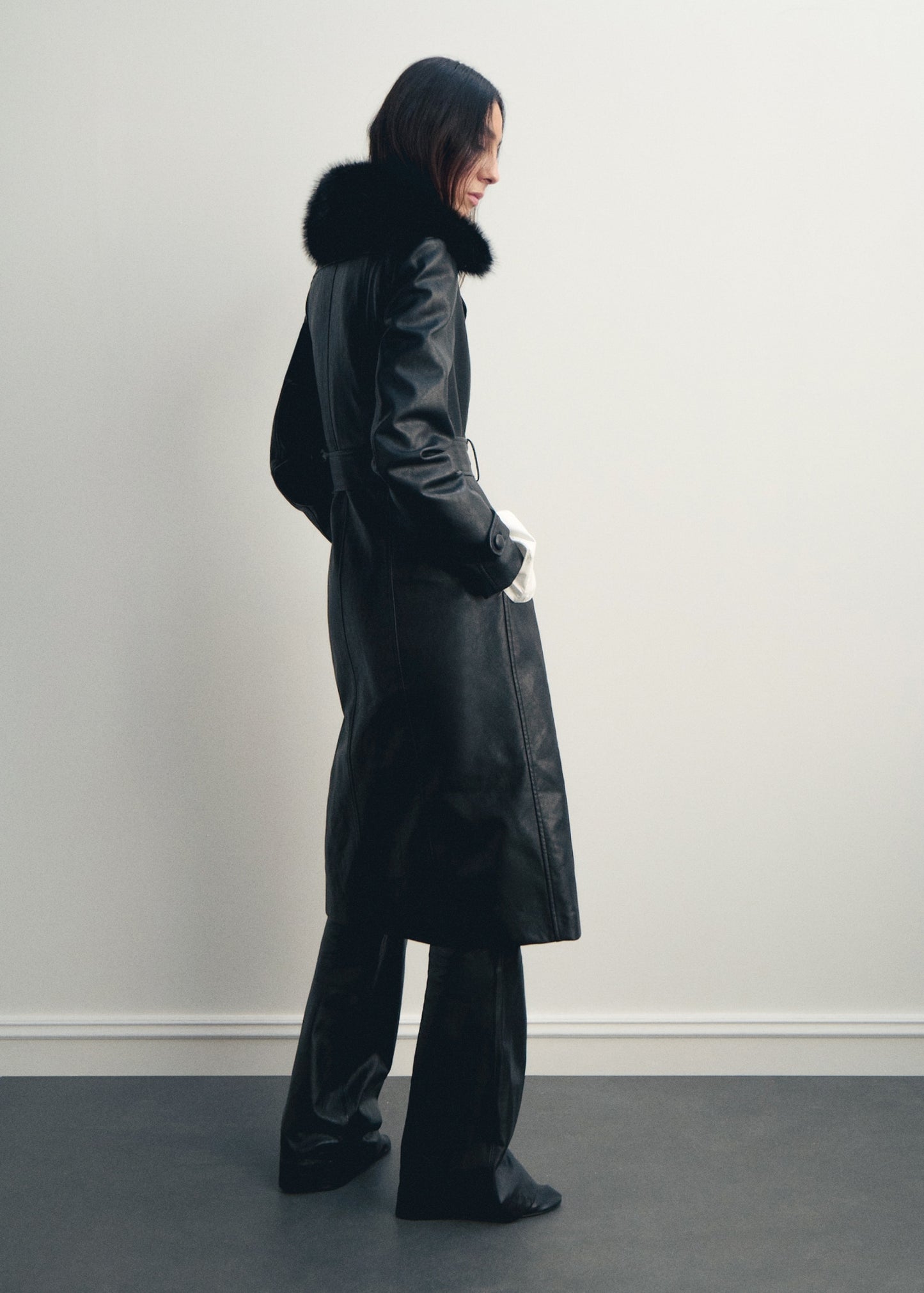 Leather-effect coat with fur collar