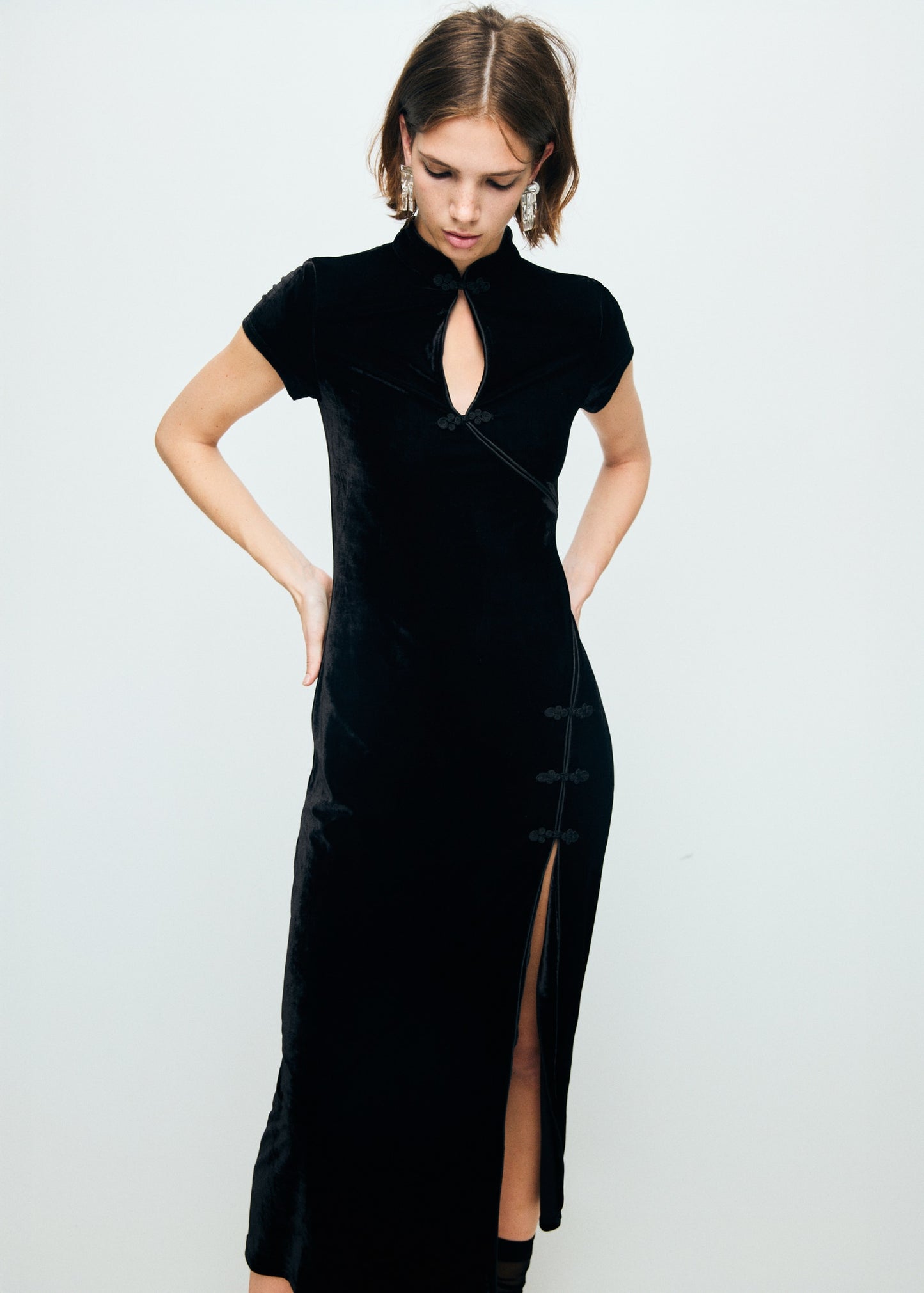 Velvet dress with toggle fastenings and slit
