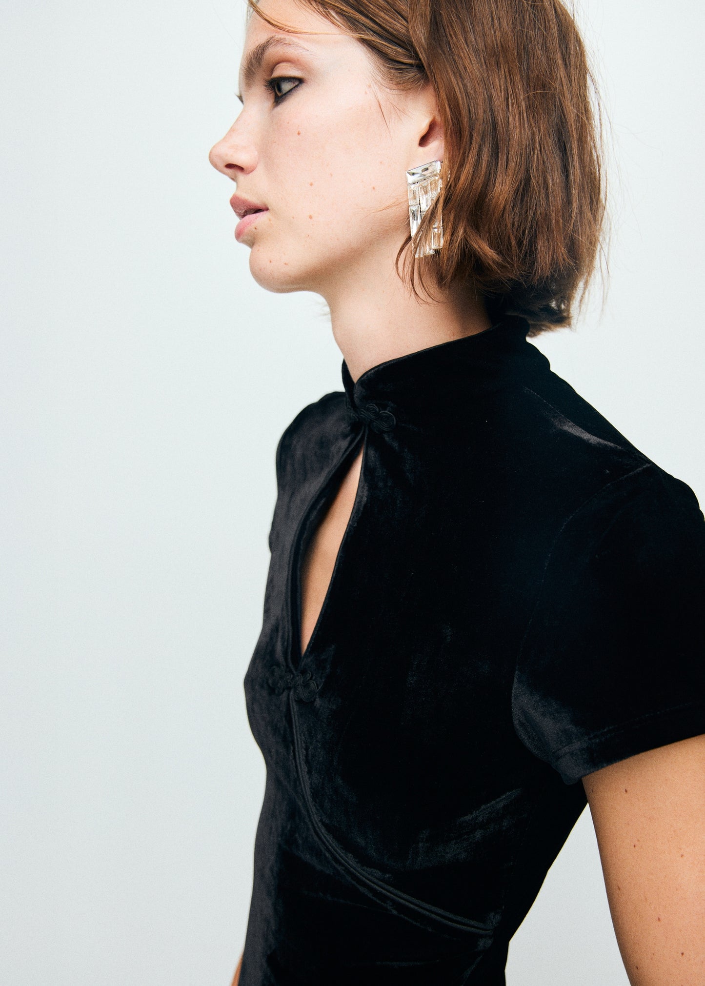 Velvet dress with toggle fastenings and slit