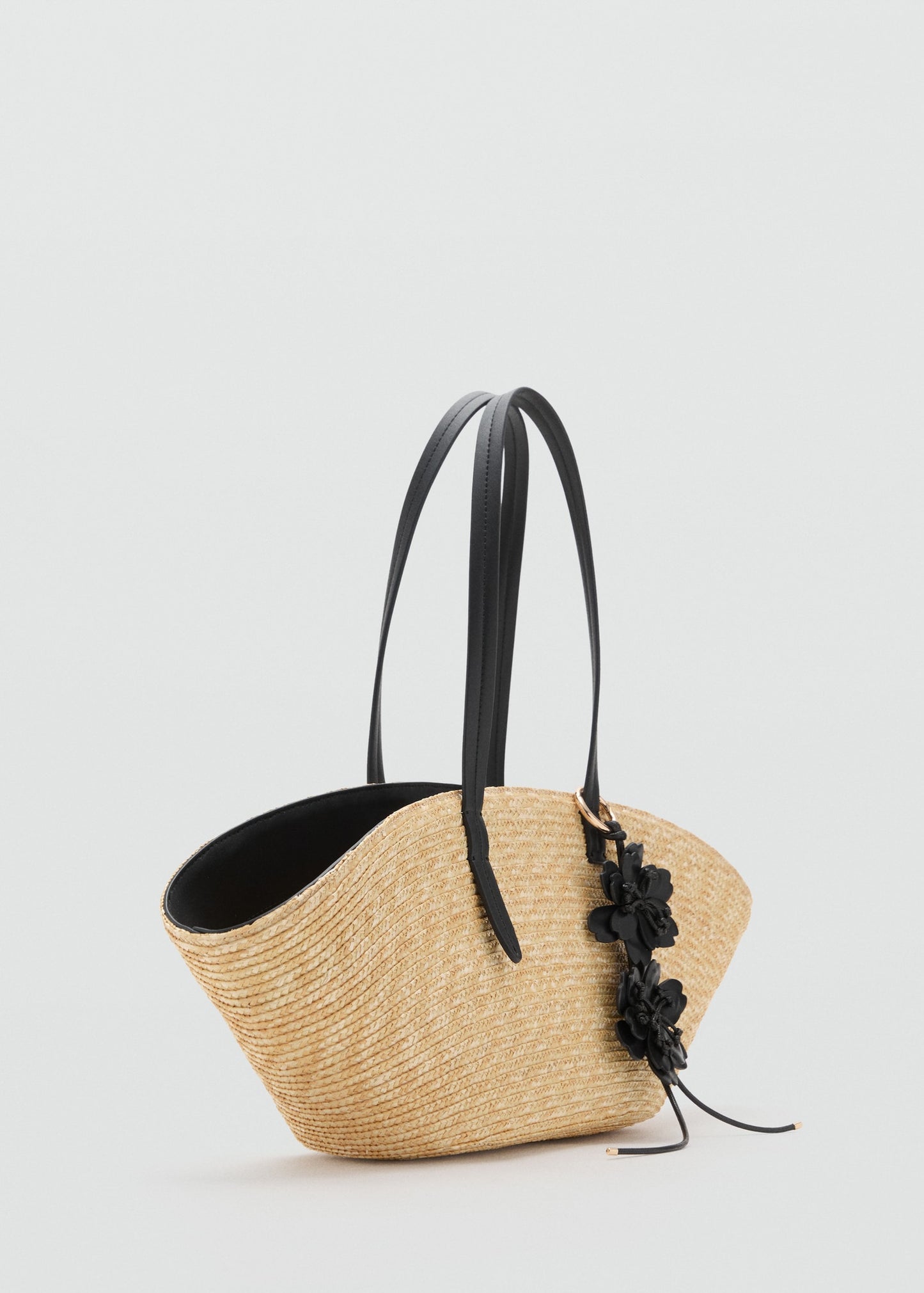 Natural fibre basket with flower charm
