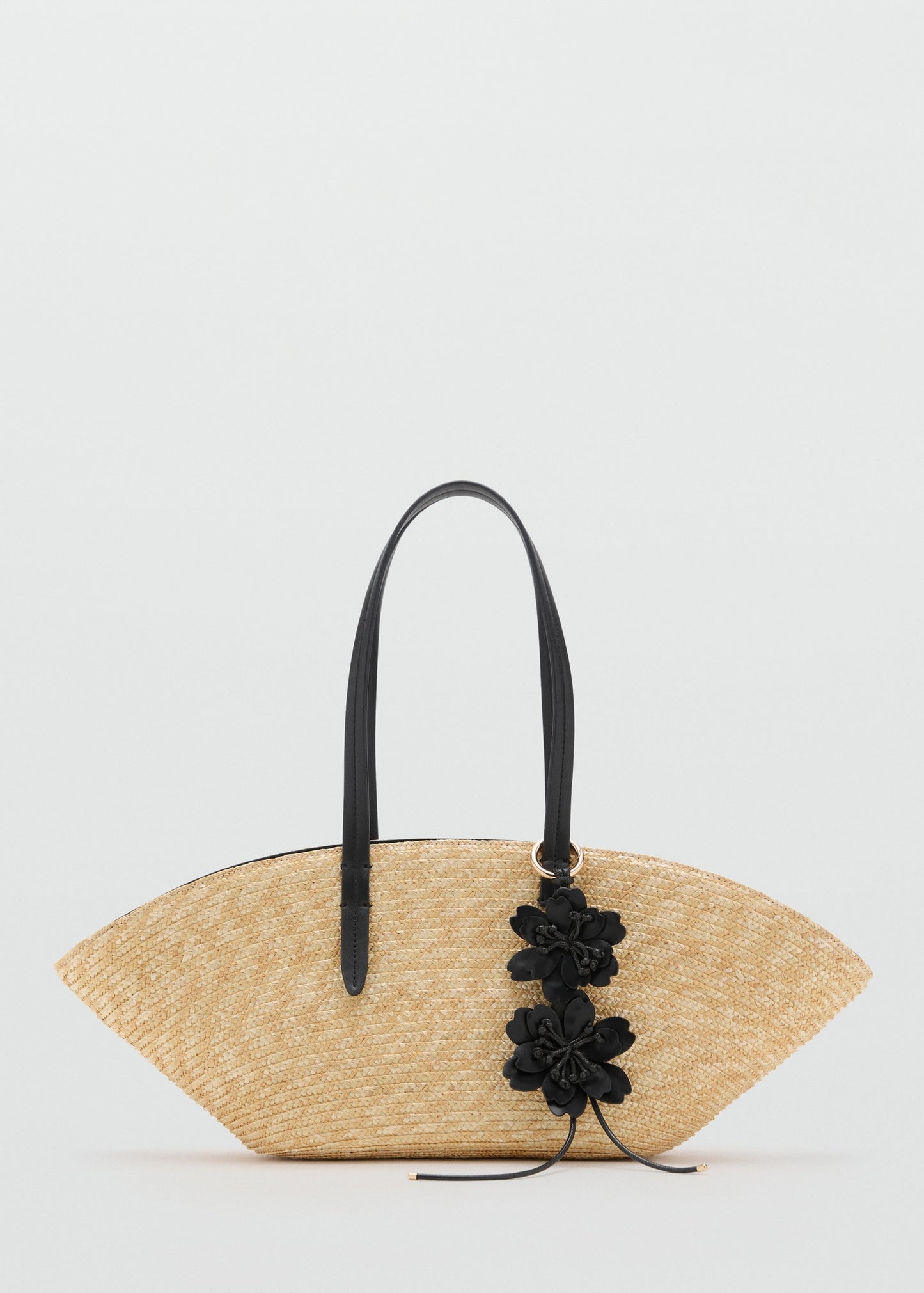 Natural fibre basket with flower charm