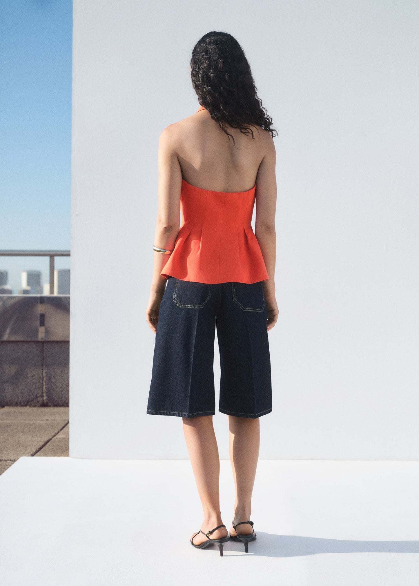 Halter-neck peplum waistcoat