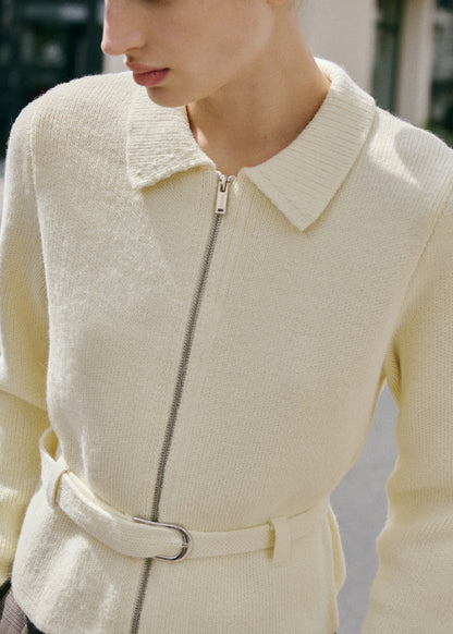 Knitted jacket with belt buckle