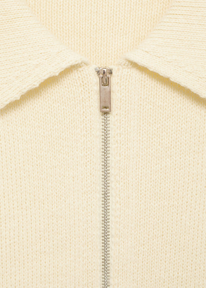 Knitted jacket with belt buckle