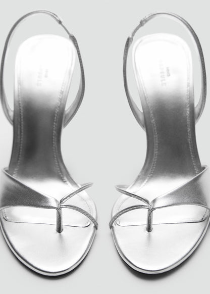 Leather sandals with contrasting heels