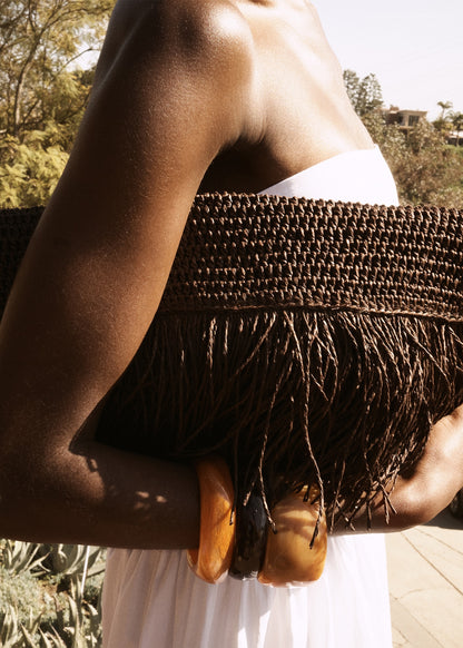 Natural fibre handbag with fringes